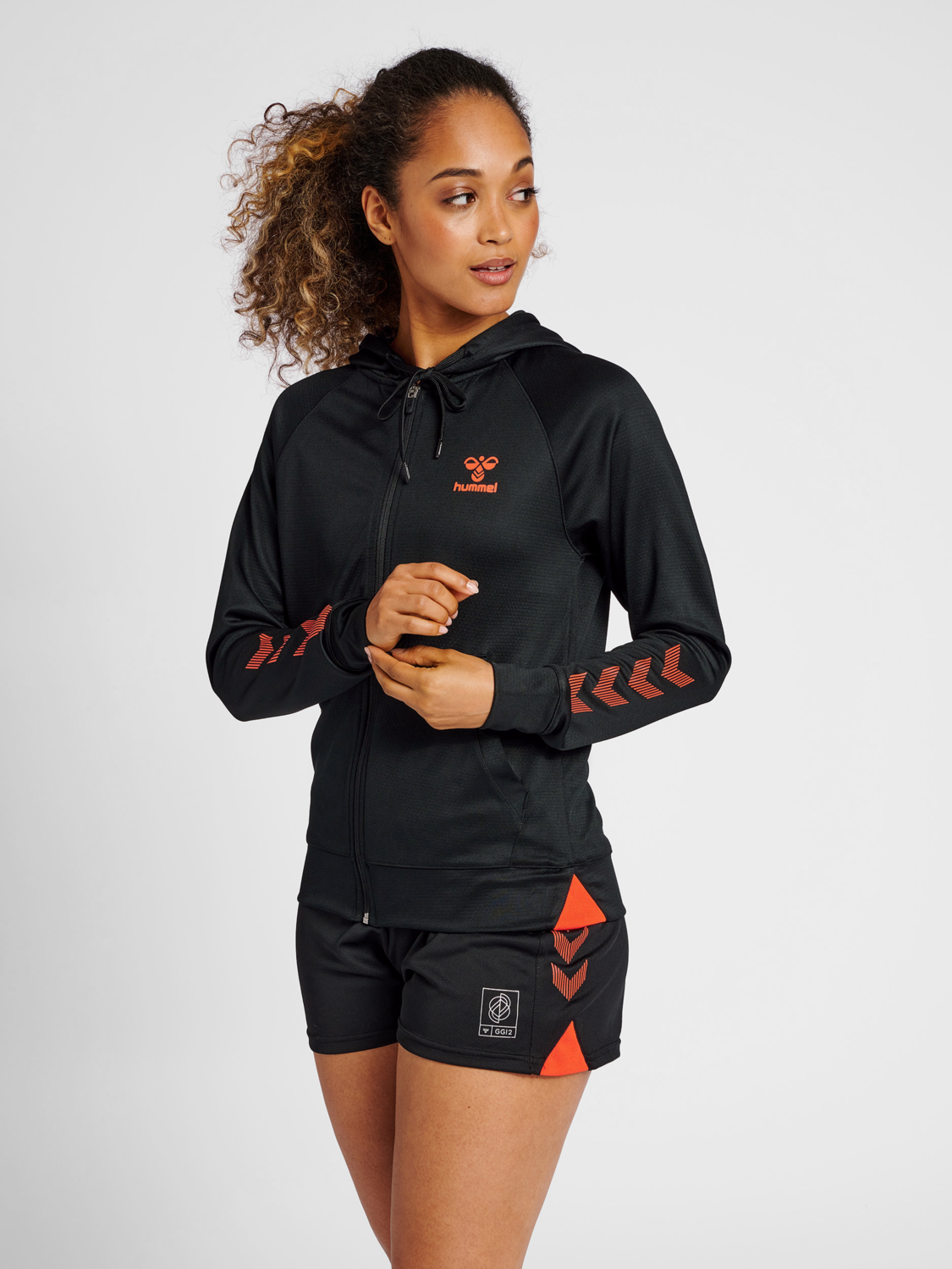 hmlGG12 ACTION ZIP HOODIE WOMAN