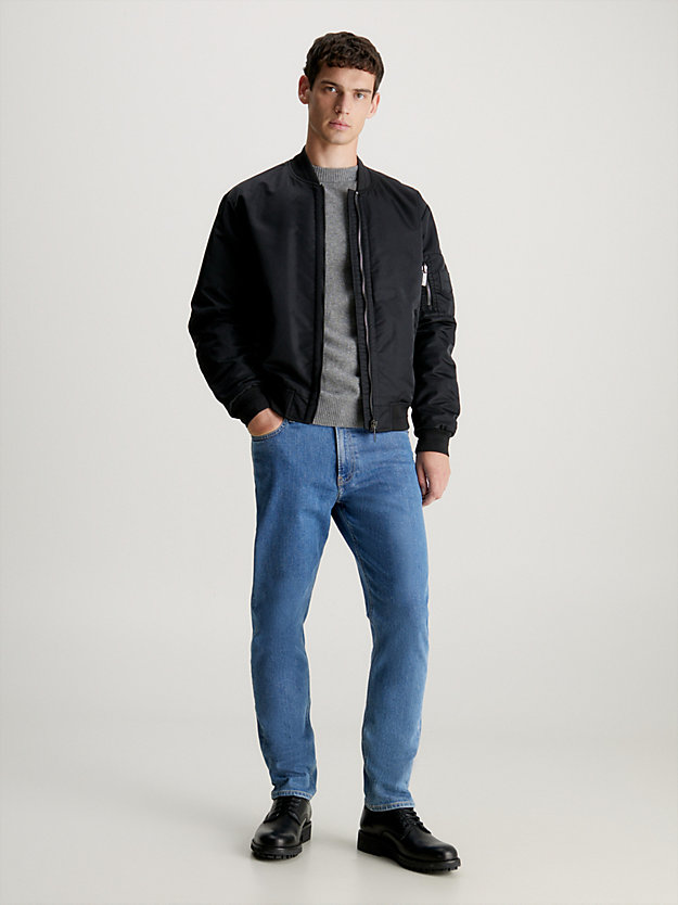 Calça jeans afunilada