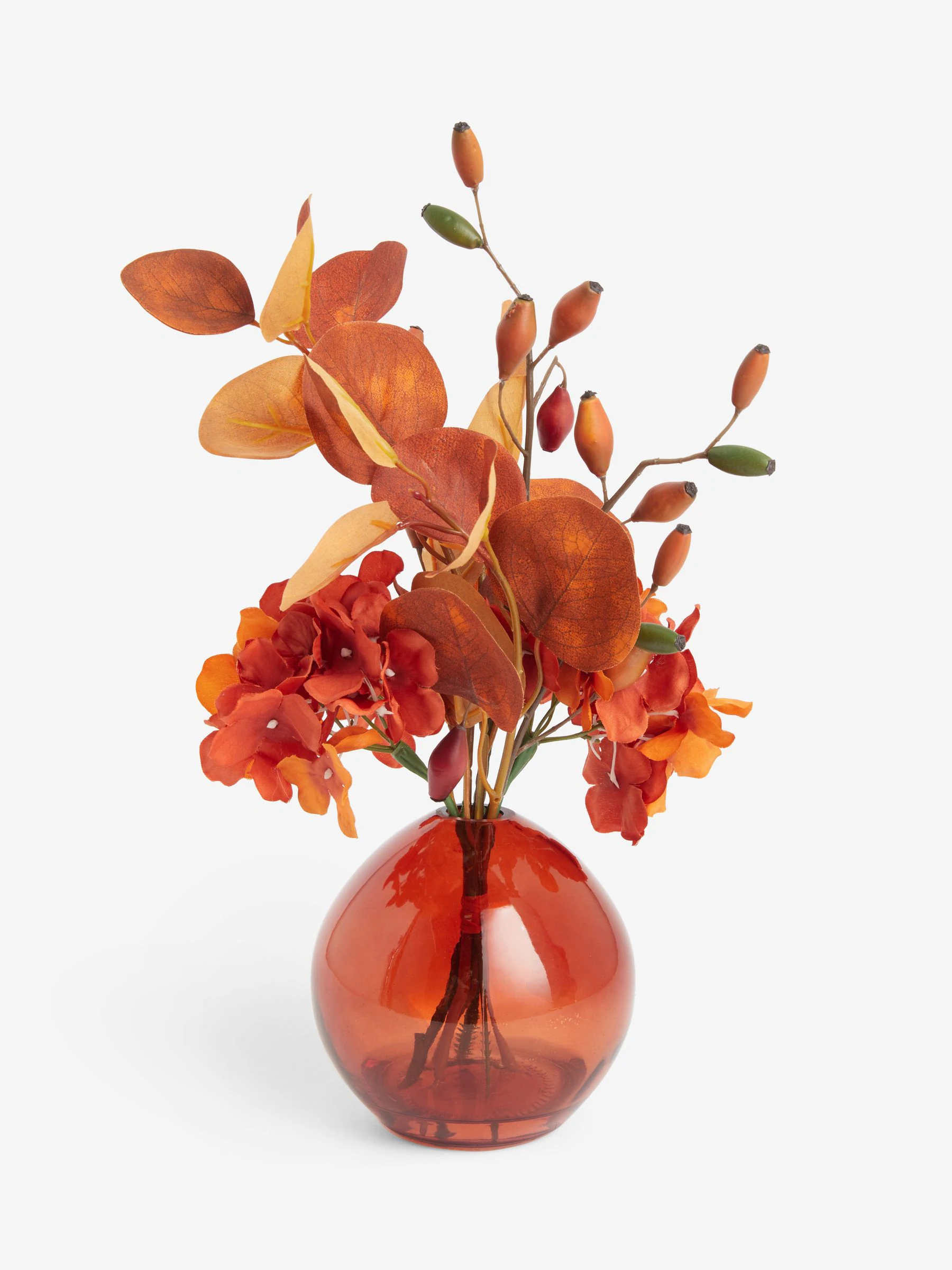 Arrangement met kunsthortensia in glazen vaas