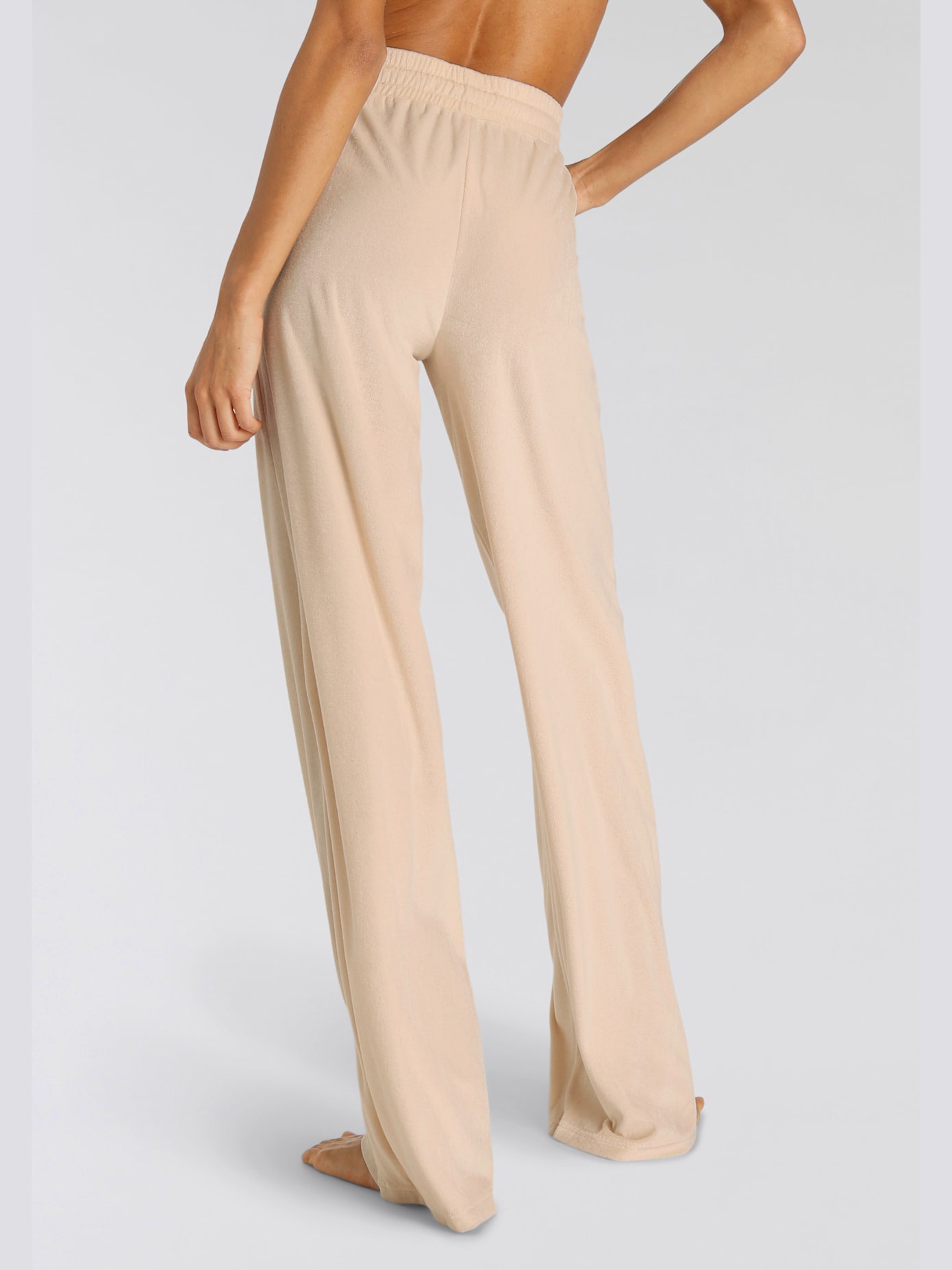Pantalon en velours ras avec jambes larges