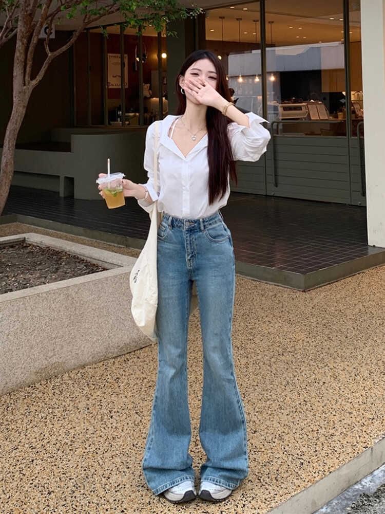 Yako - Mid Rise Washed Bootcut Jeans