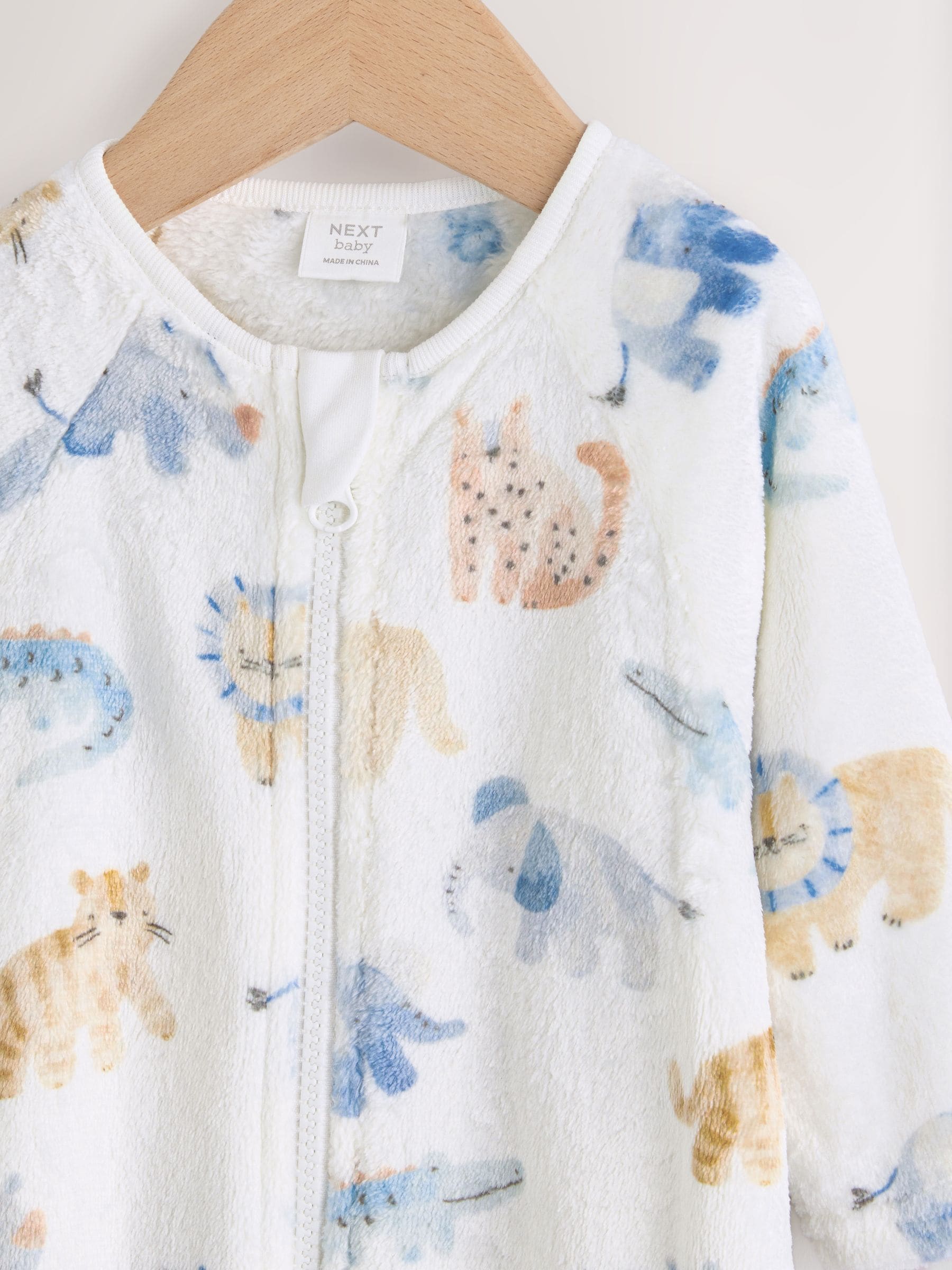 Ecru met safariprint - Fleece babypyjama