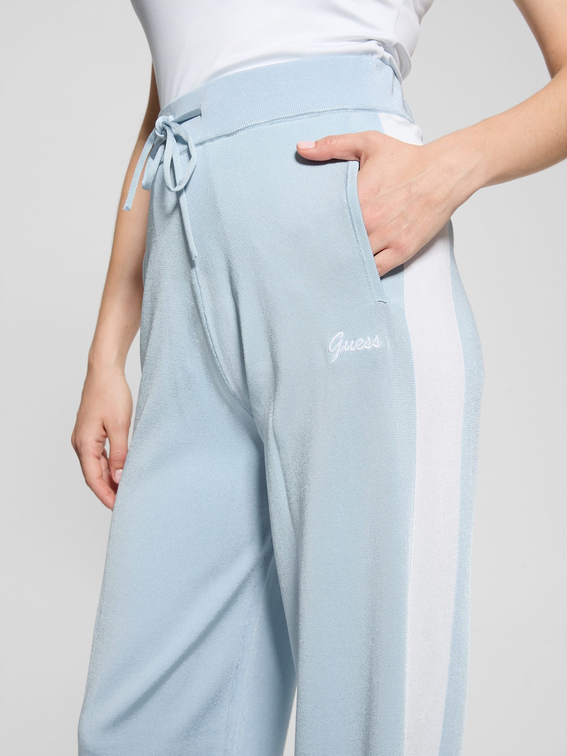 Calça de malha listrada