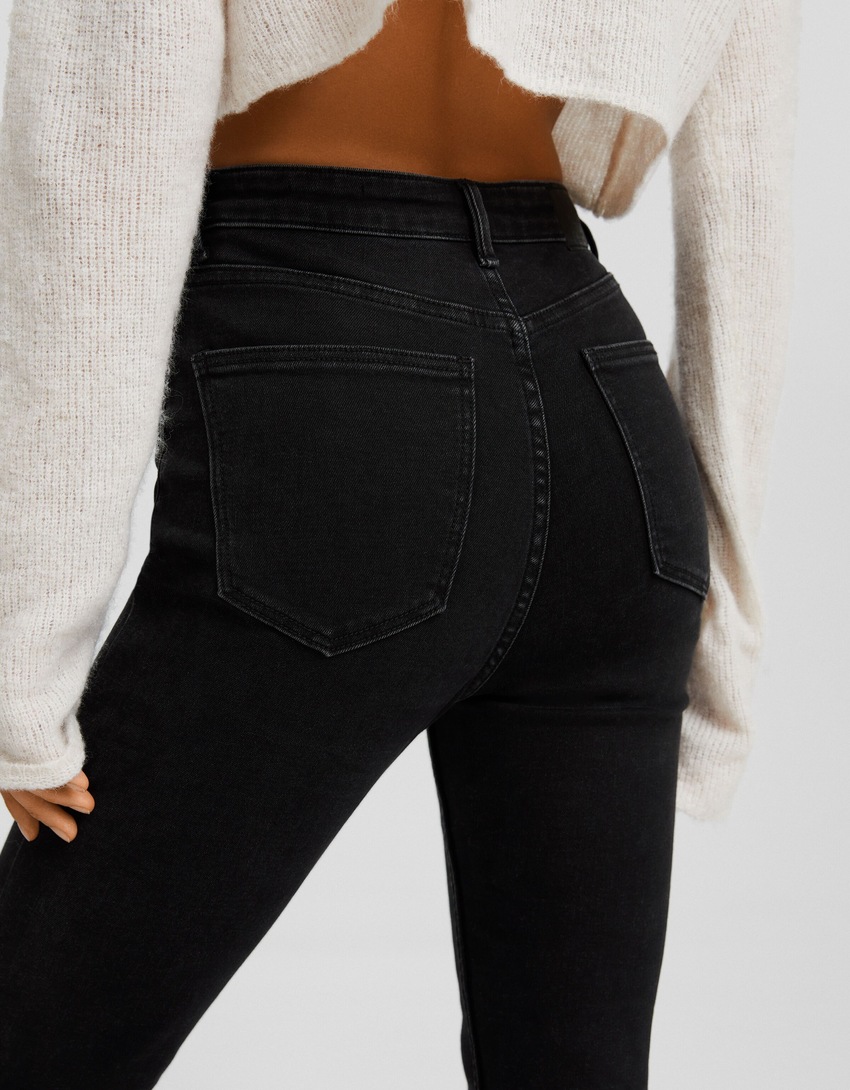 calça jeans skinny de cintura super alta
