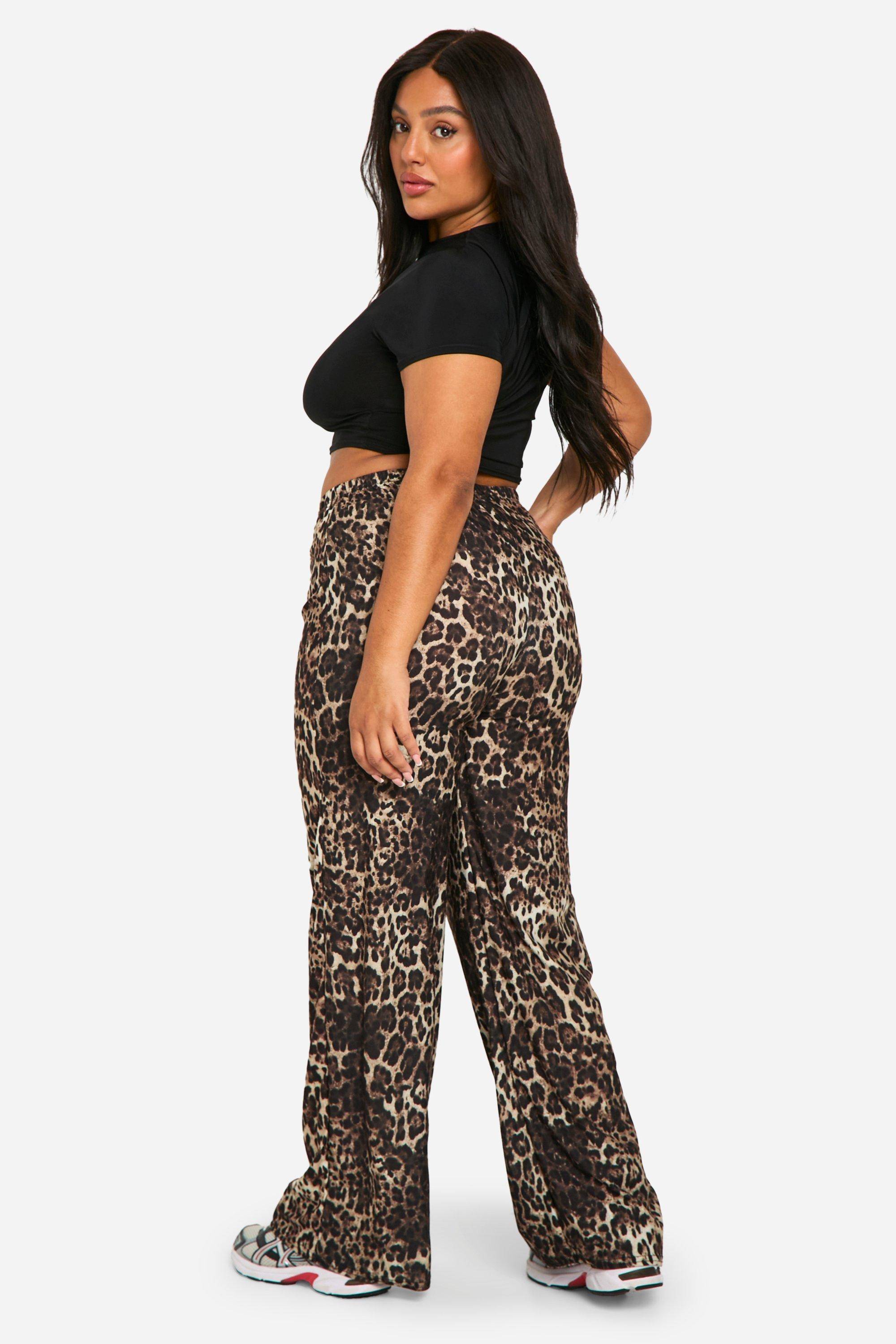 boohoo Grande taille - Pantalon large en jersey à imprimé léopard