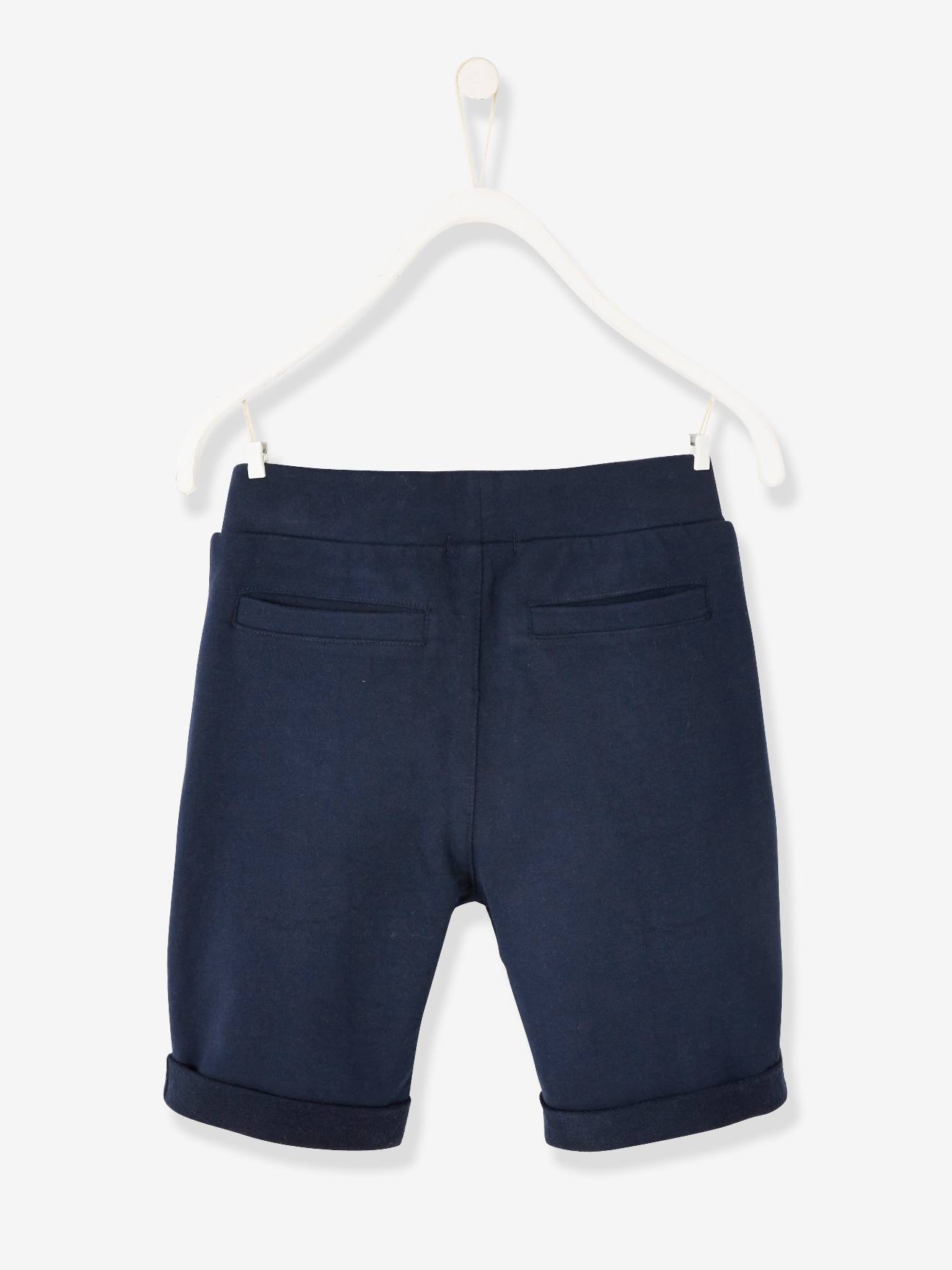 Calções desportivos lisos azul-escuros para meninos com estampas.