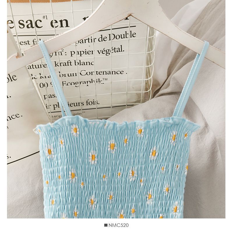 Lemongrass - Spaghettibandjes met madeliefjesprint en gesmokte mesh midi-lijnjurk
