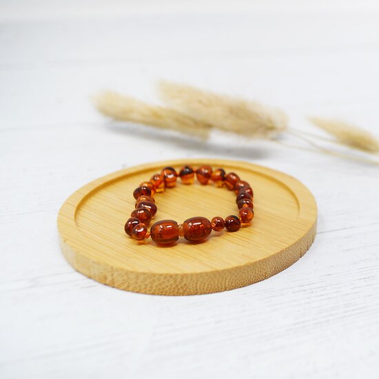 Bracelet Ambre bébé   Cognac        de               Irréversible