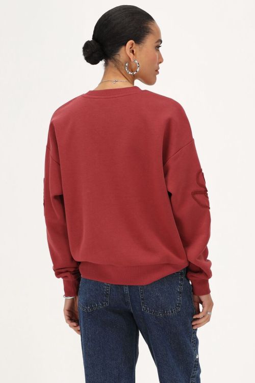Rode sweater met embroidery