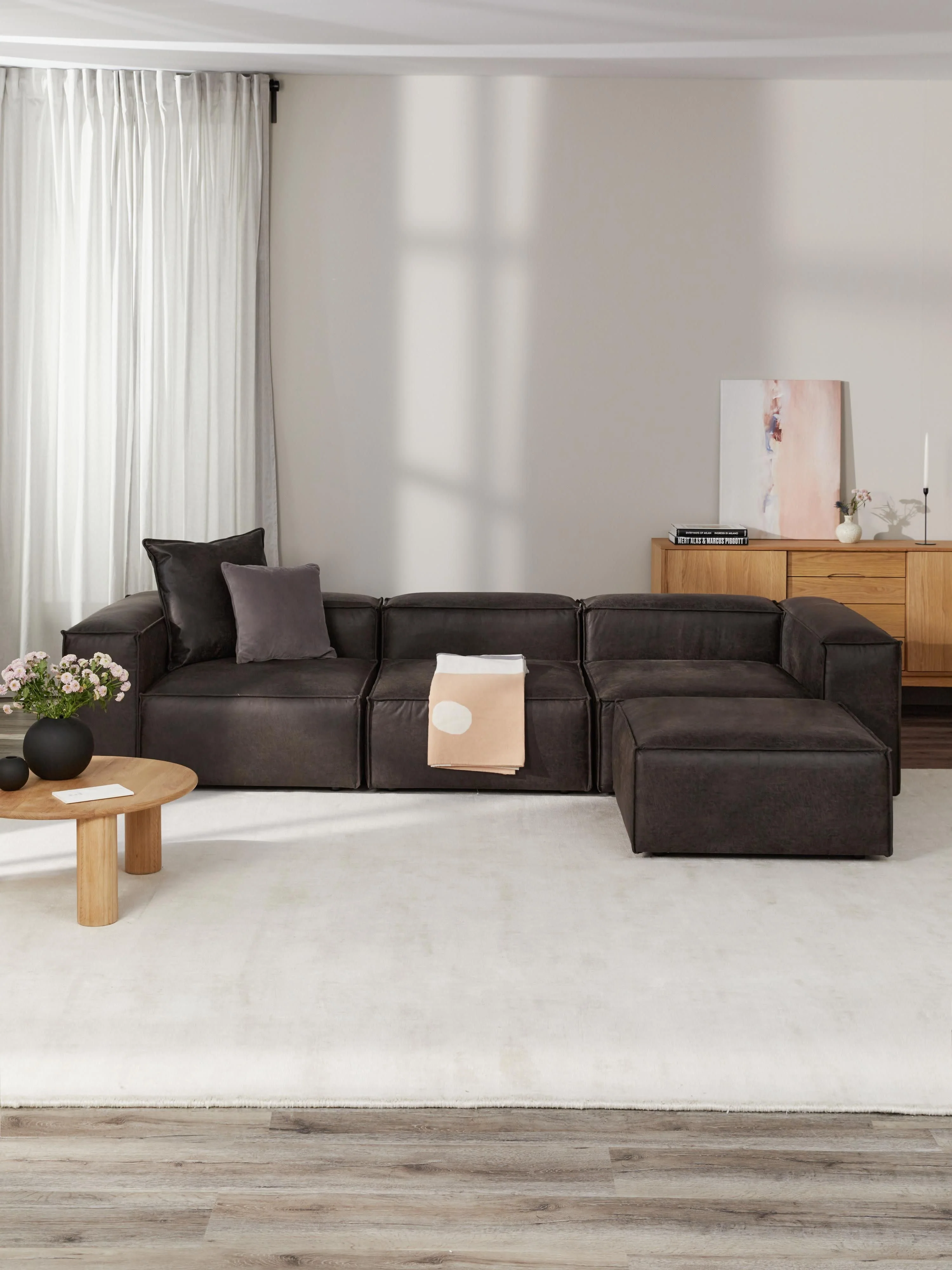 Modulaire bank Lennon (4-zits) van gerecycled leer met poef (links/rechts)