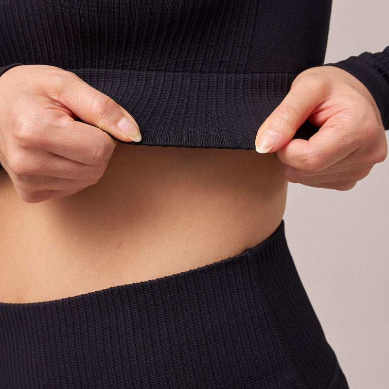 Geripptes Sportshirt langarm Damen aus recyceltem Polyamid Pastellgrün