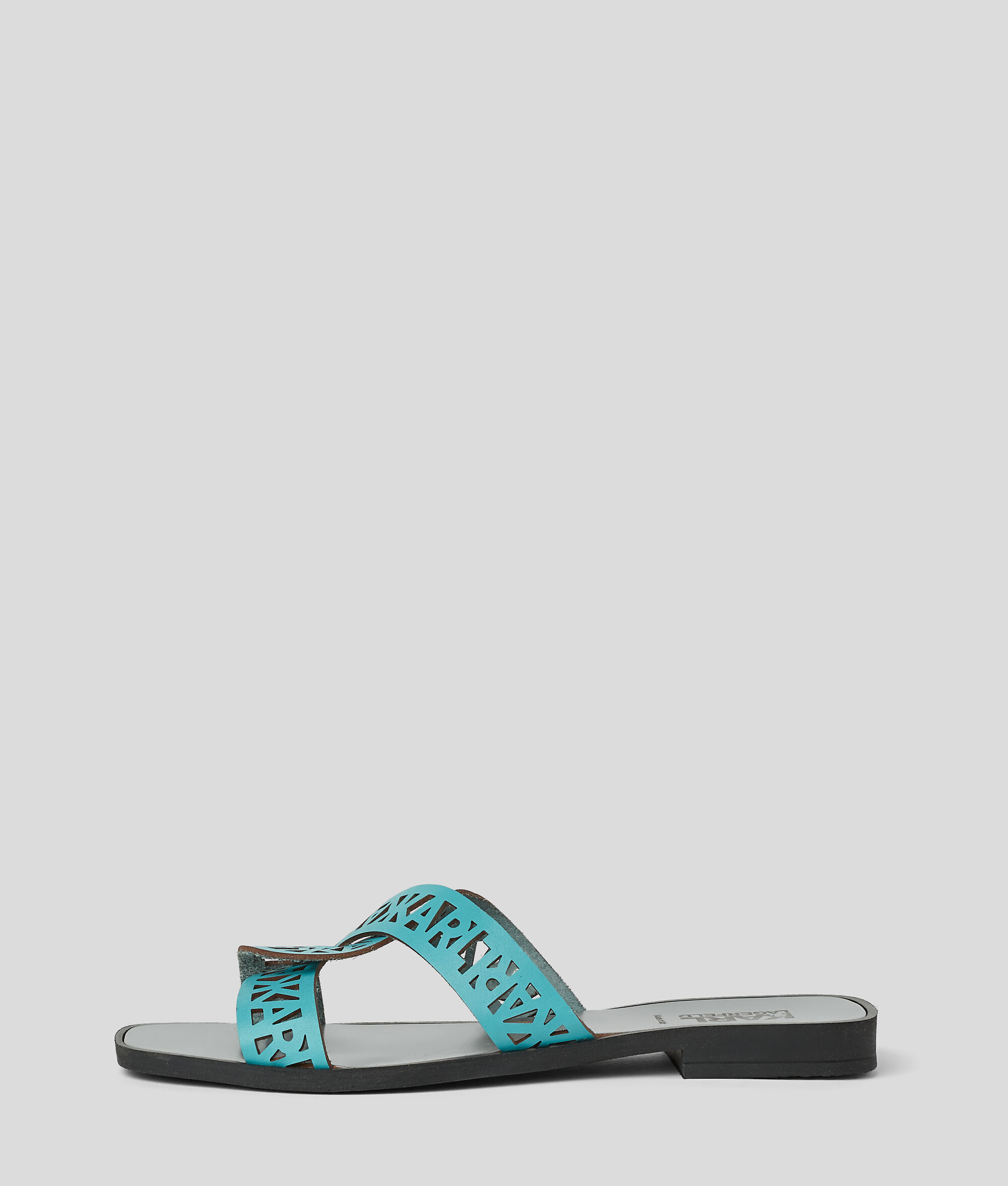 Mules à boucle Interlok Skoot