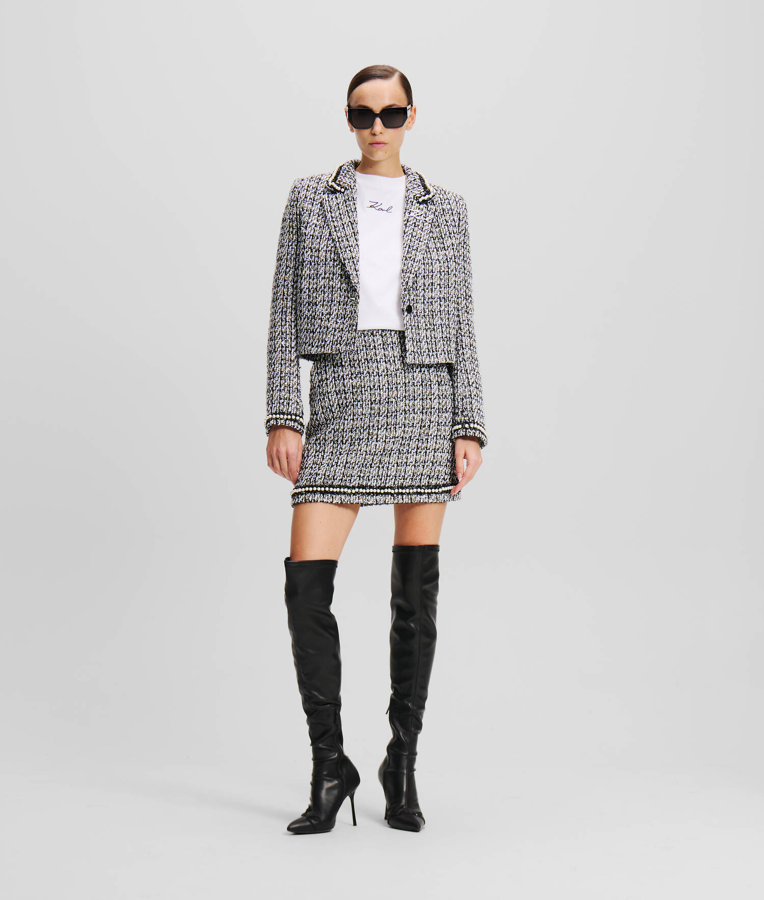 VESTE EN BOUCLÉ ORNÉE DE PERLES
