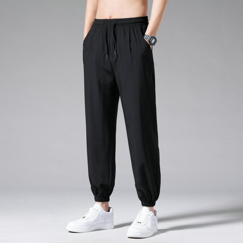 Acrius - Effen cropped harembroek met trekkoordtaille