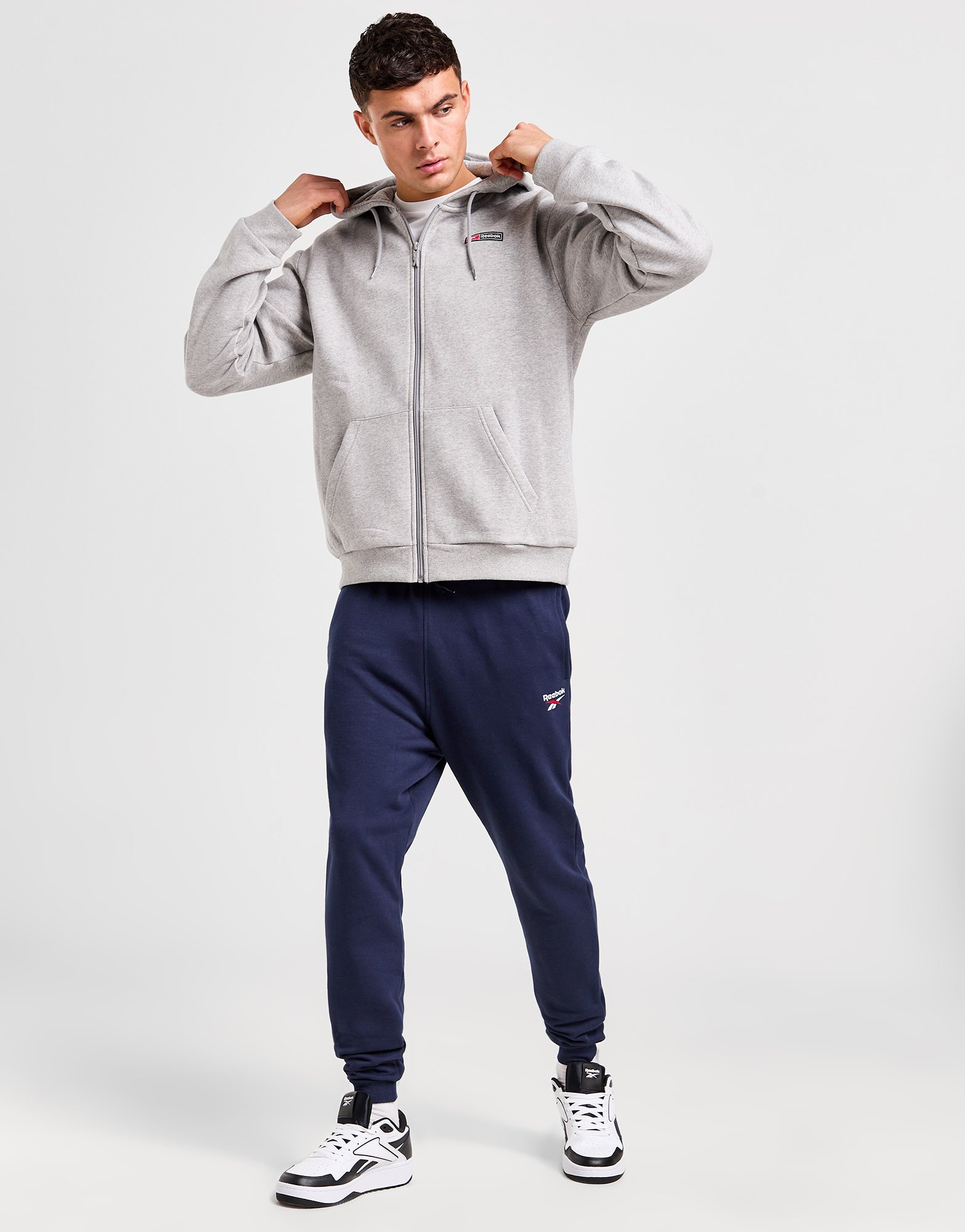 Reebok Sweat à Capuche Zippé Woven Homme