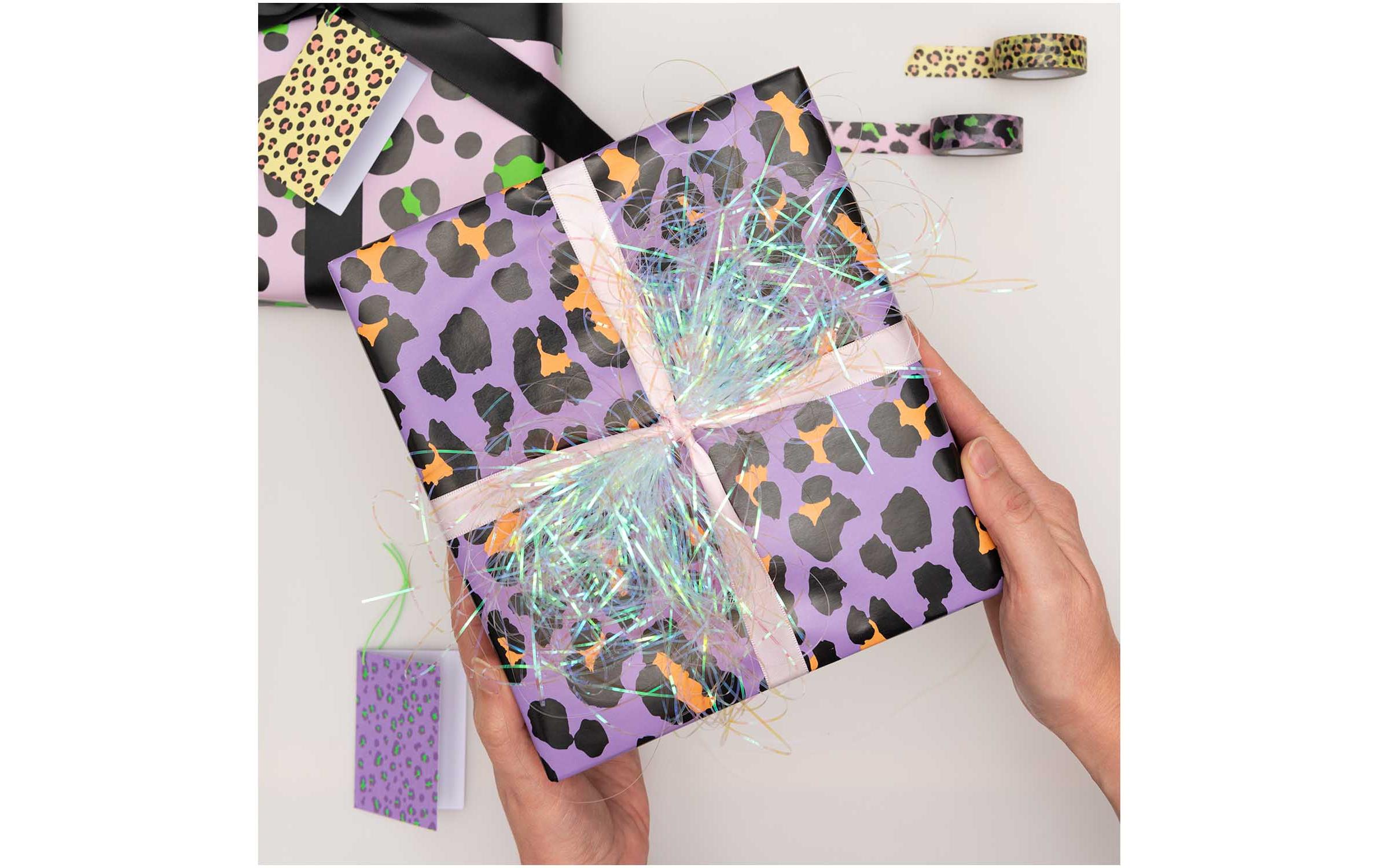 Geschenkpapier Leo Violett/Orange, 70 x 3 mGeeignet als Geschenkverpackung oder Einfasspapier für Bücher