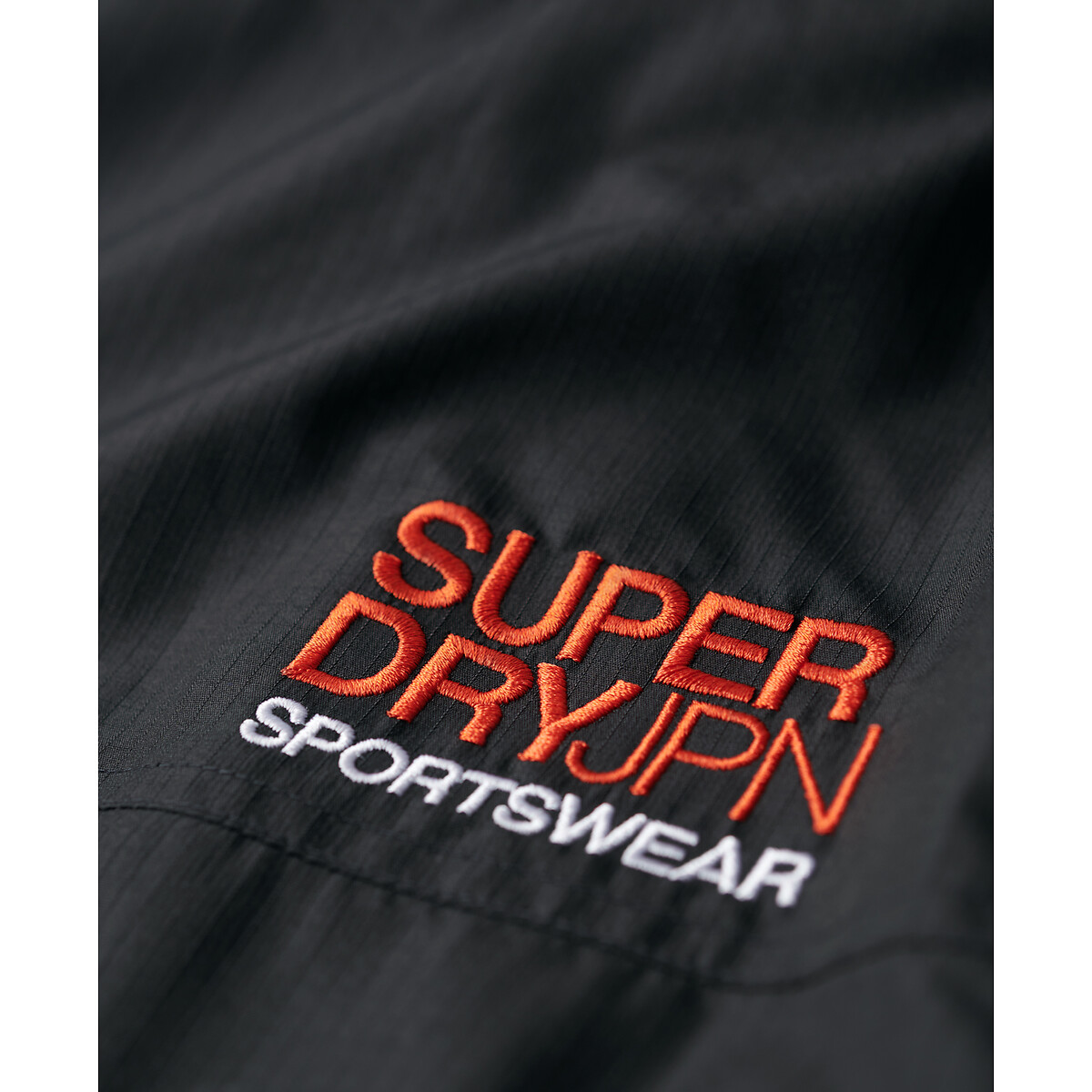 SUPERDRY<br>Corta-vento com capuz
