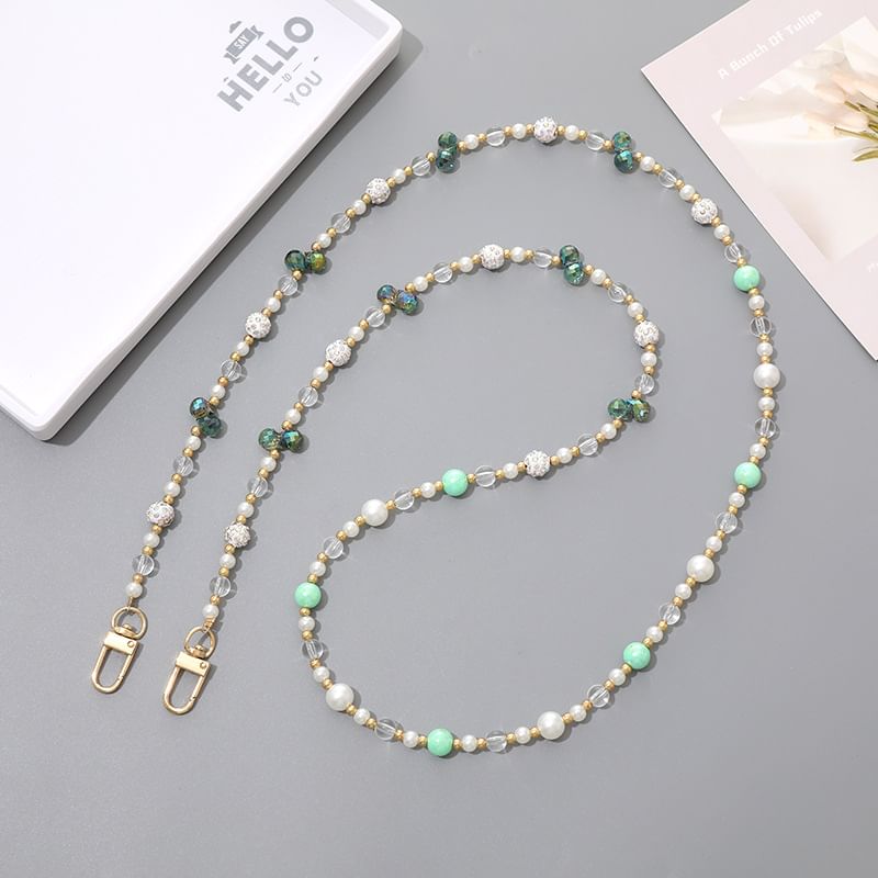 XIXI STUDIO - Telefoonkoord met strass-kralen