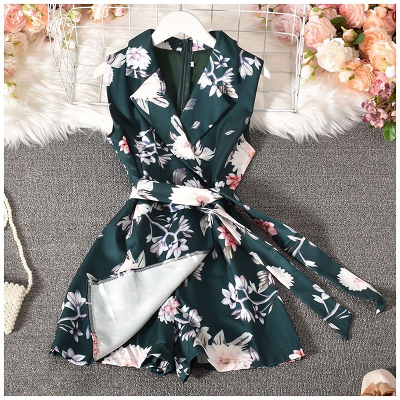 Dudu - Mouwloze romper met bloemenprint en strikceintuur