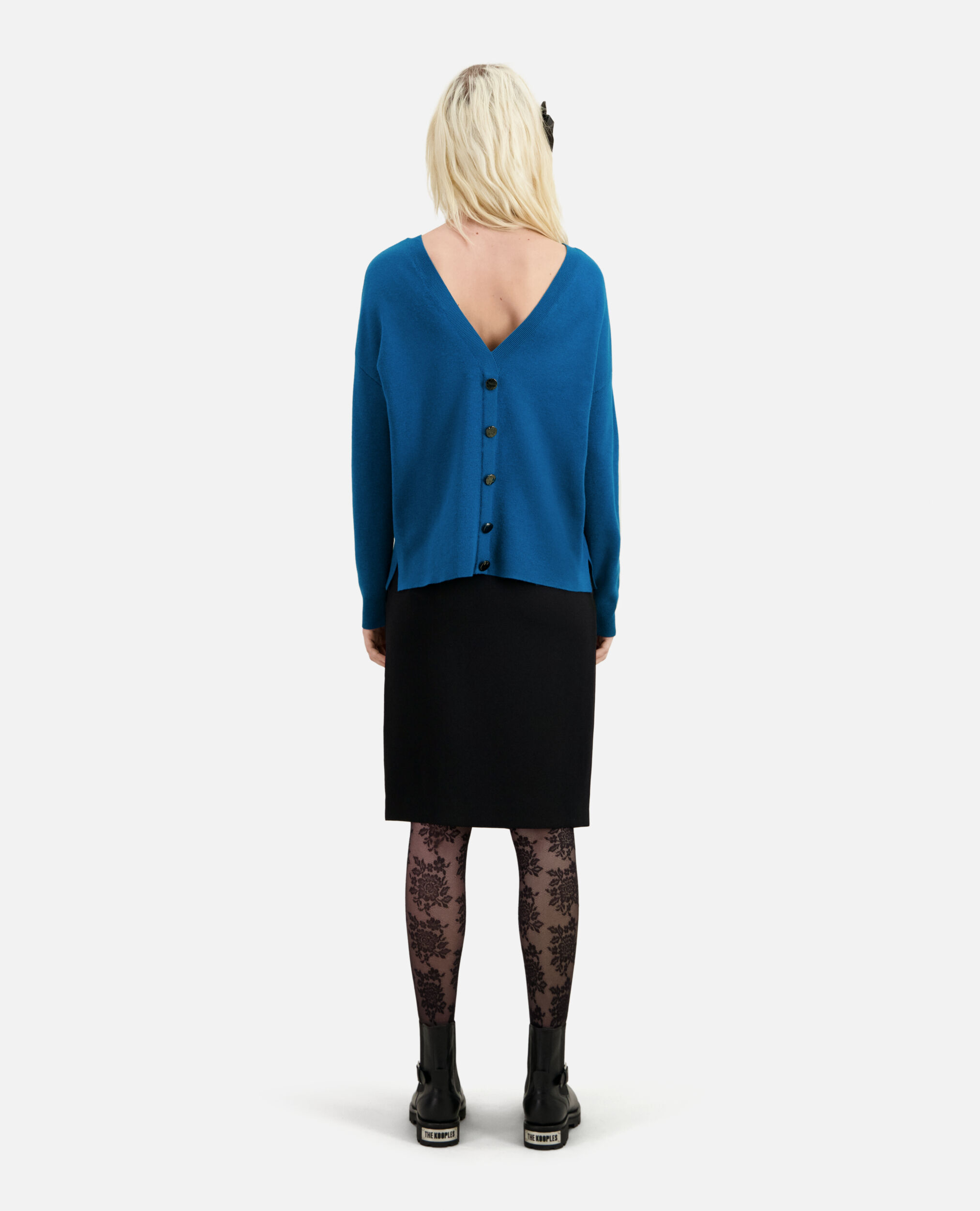 Blue sweater with buttoning on the back