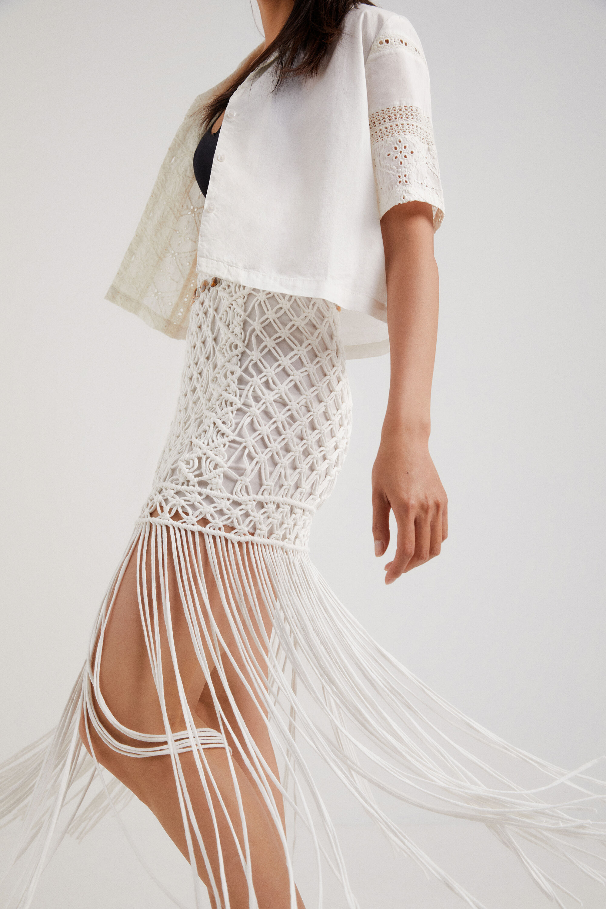 Mini-jupe en macramé à franges