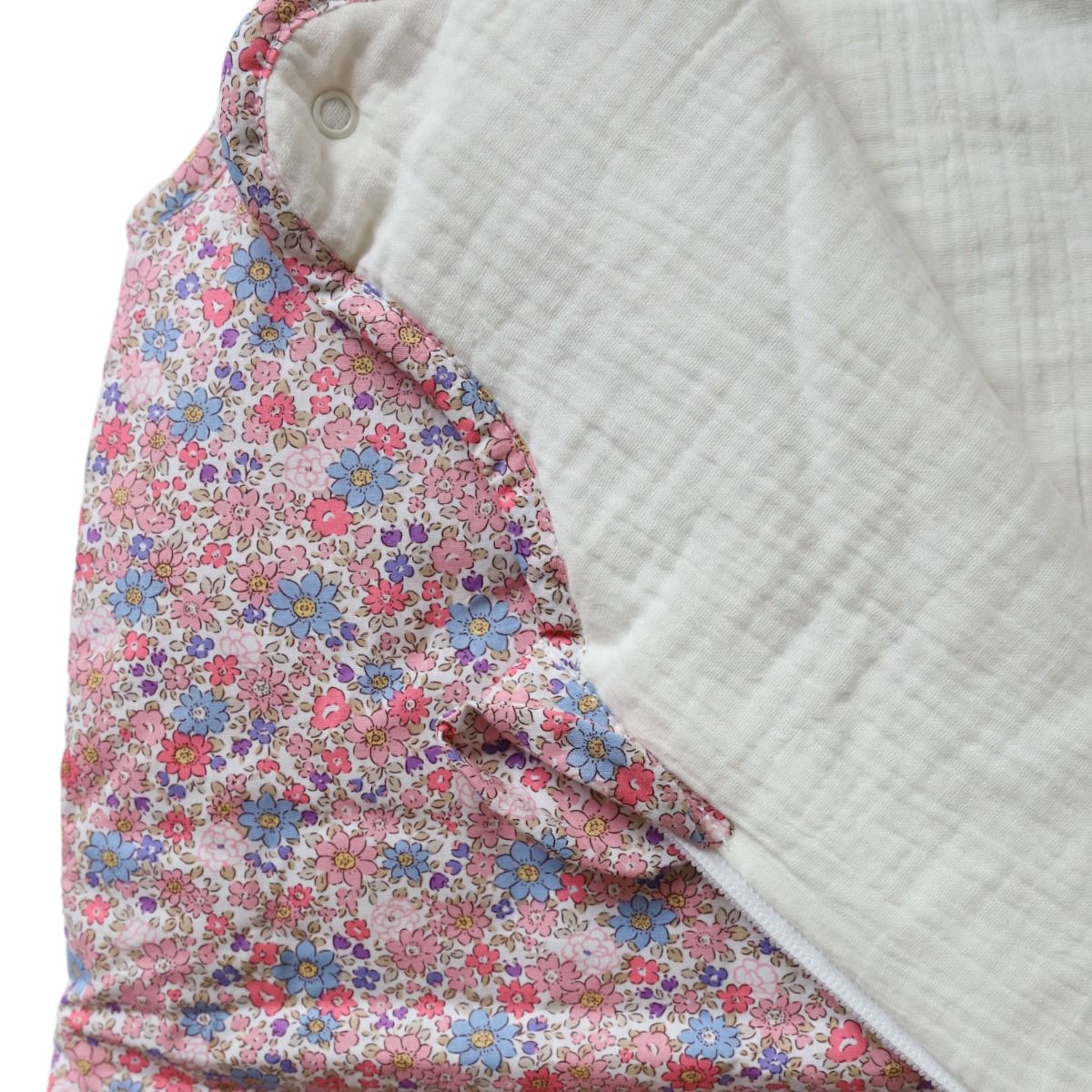 Gigoteuse fleurie bleu et rose
