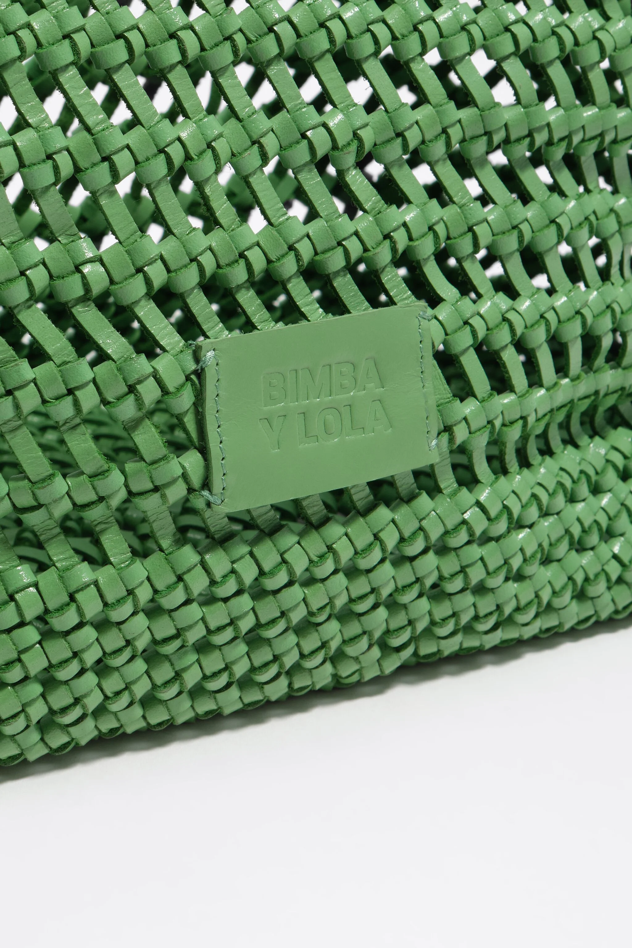 Bolsa de compras grande em couro trançado verde-esmeralda