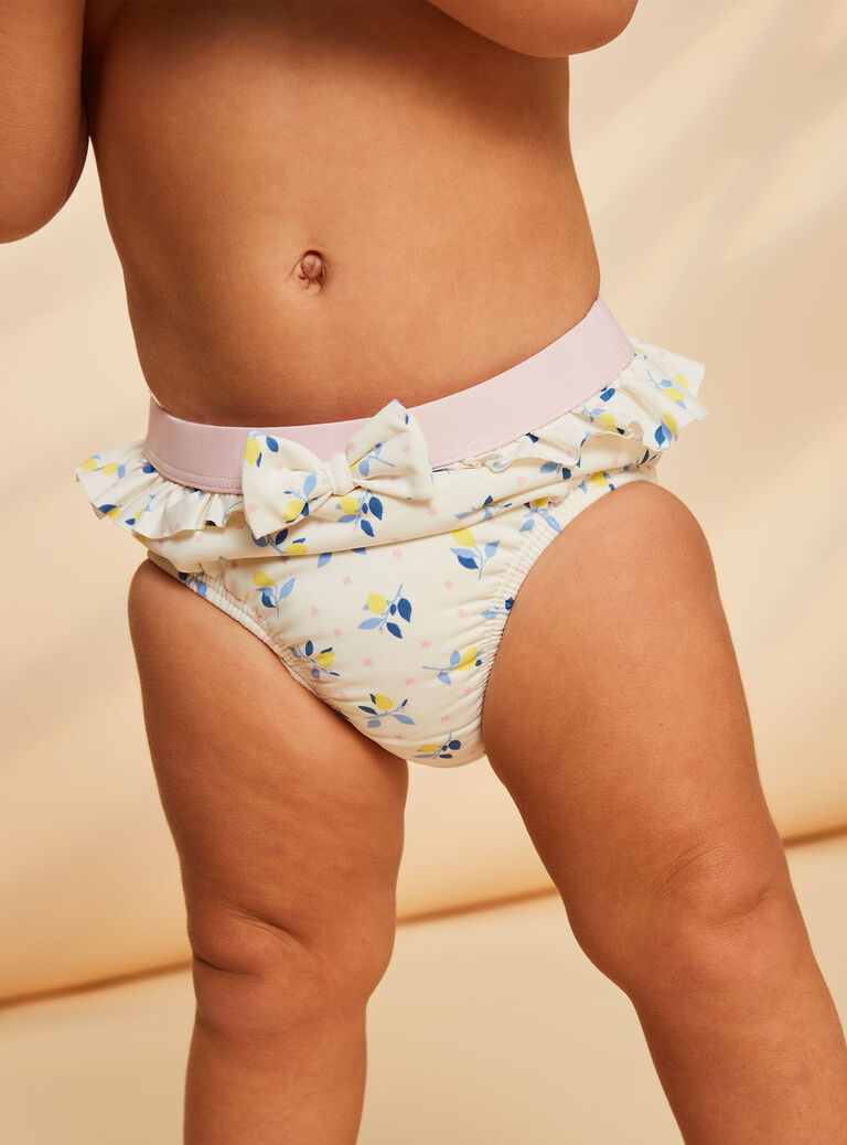 Maillot de bain blanc et rose pâle à imprimé fleuri
