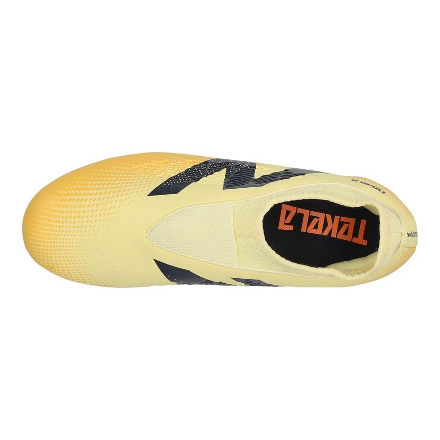 New Balance Tekela V4 Magique FG Energy Rush - Parchment/Noir/Orange Enfant