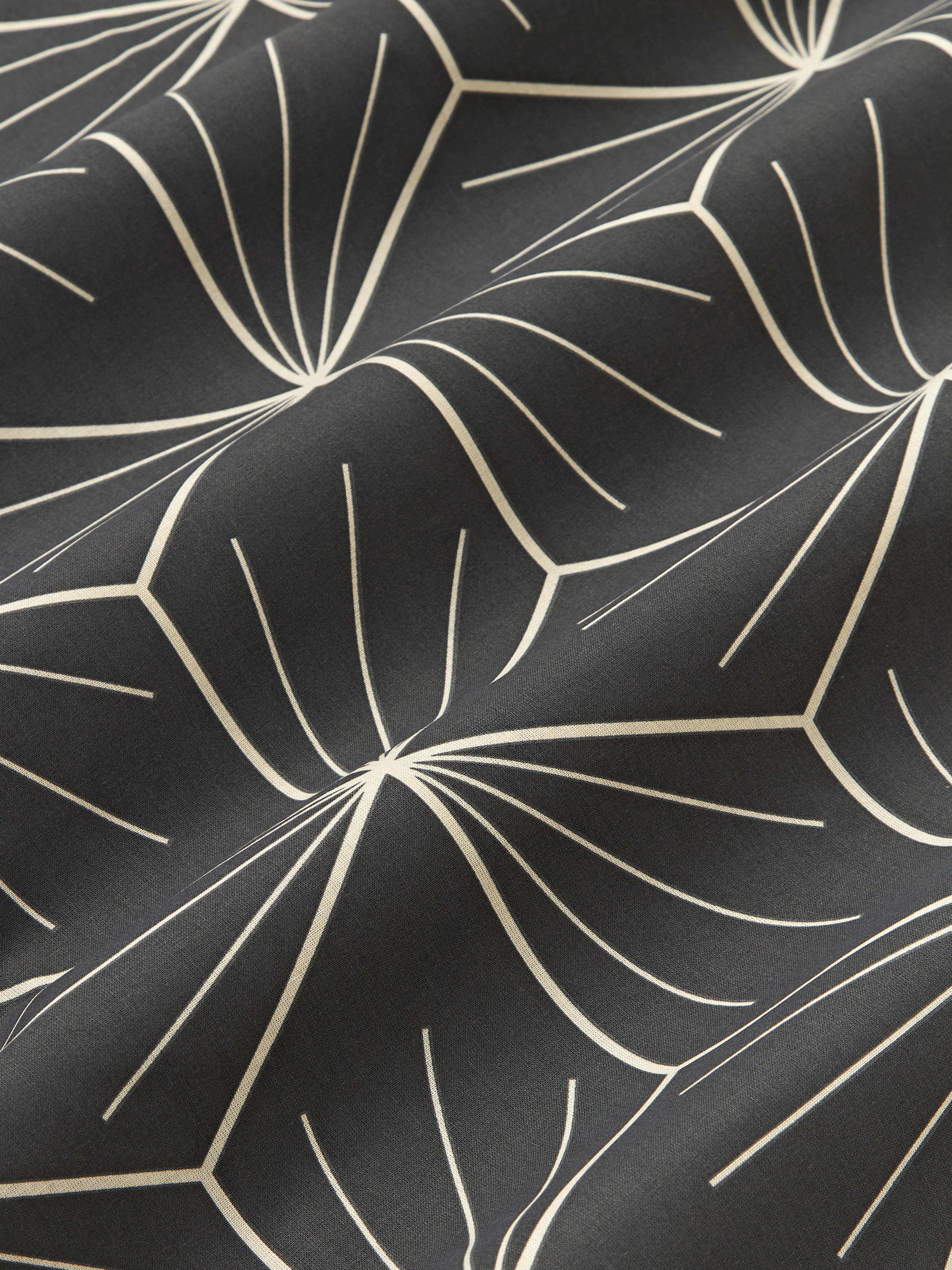 Omkeerbare kussenhoes Ilda met geometrische print