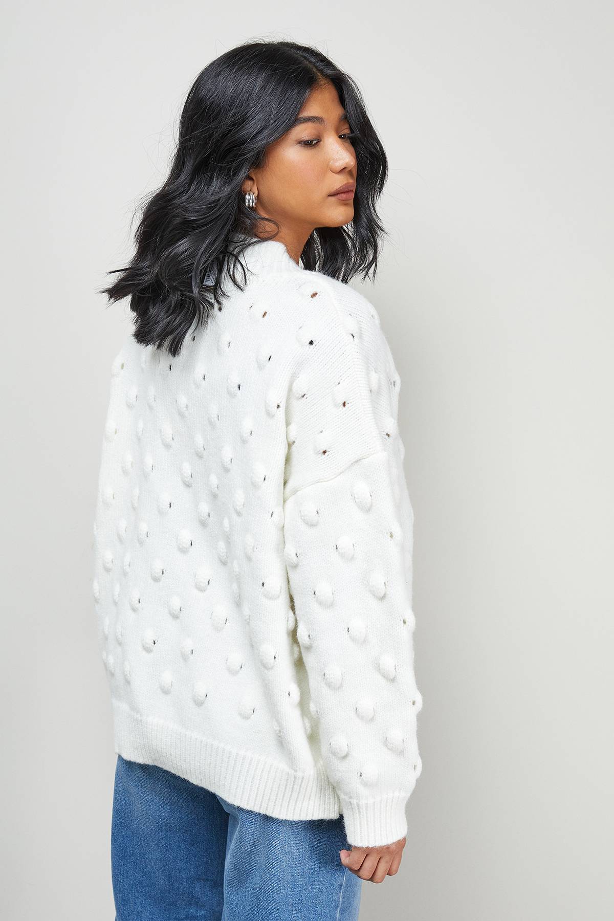 Warehouse synthétiquell Col V Ample en Maille Bubble