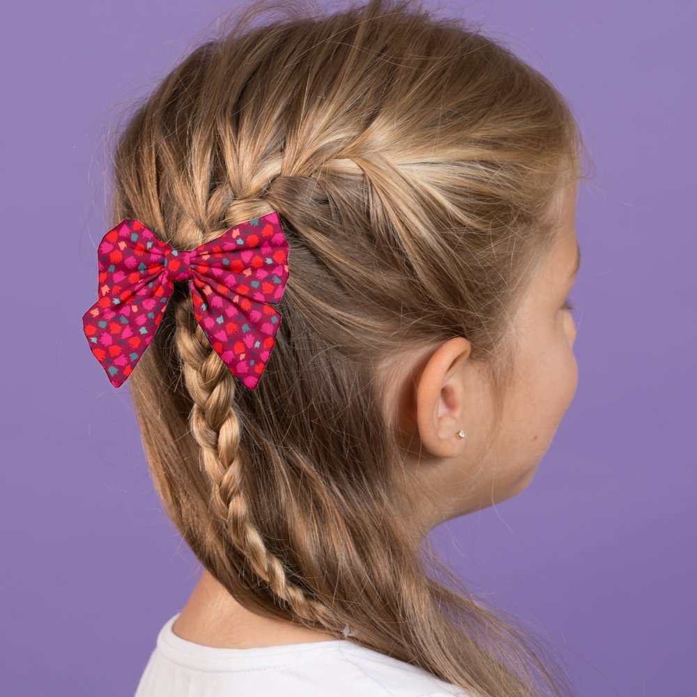 Barrette Noeud Papillon Pompons Cerise