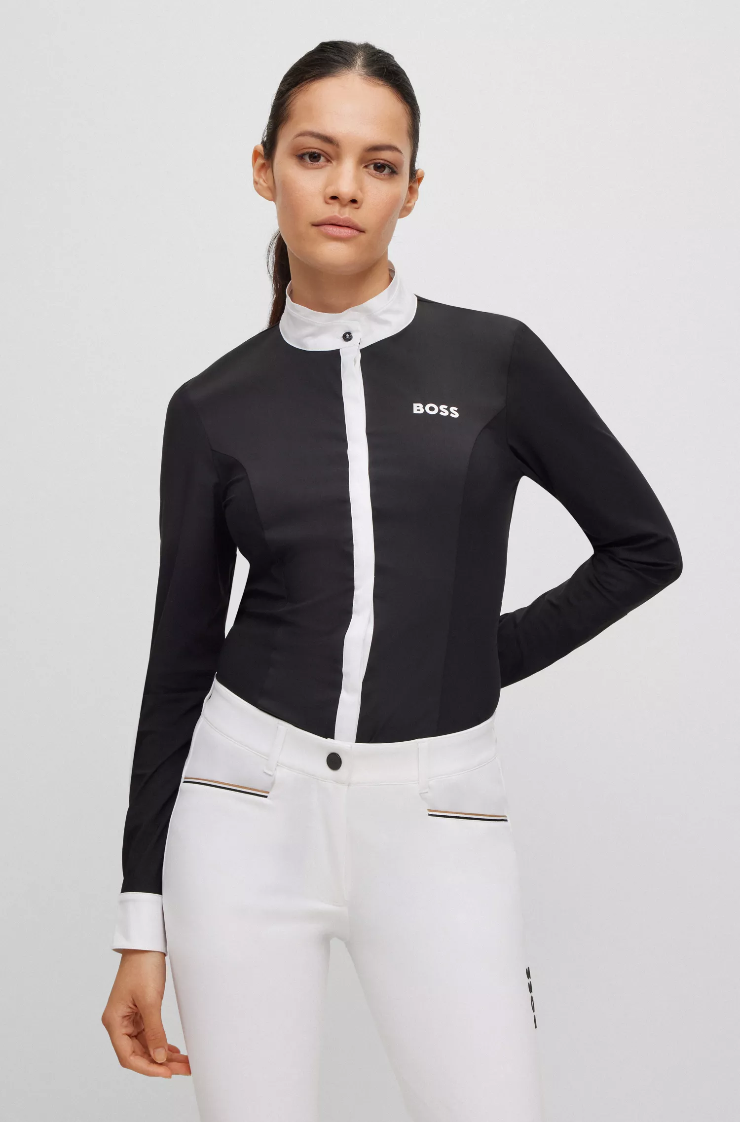 Blusa de competição BOSS Black-Equestrian de corte justo, em tecido misto.