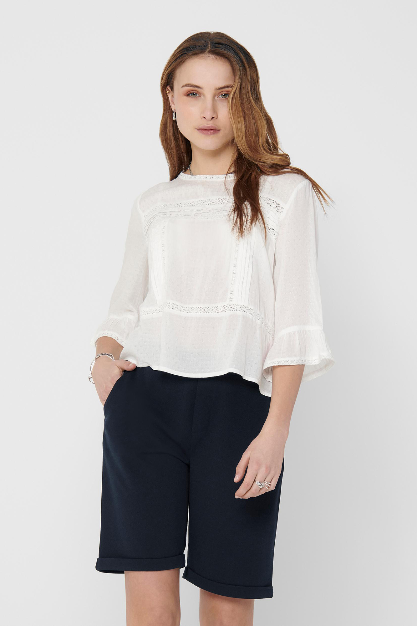 Blusa de manga 3/4 com gola redonda