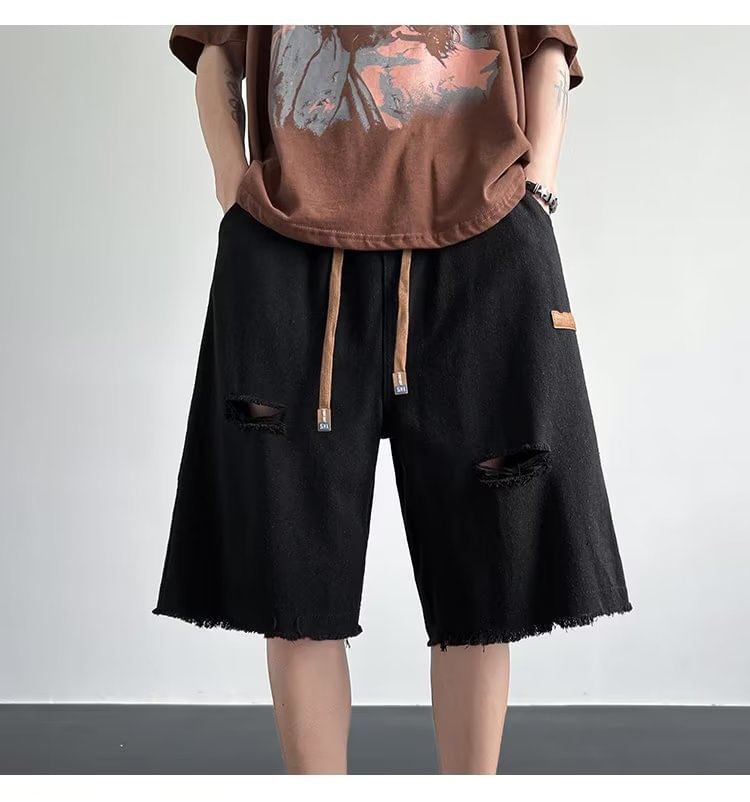 Femilina - Mid Rise Washed Distressed Denim Shorts