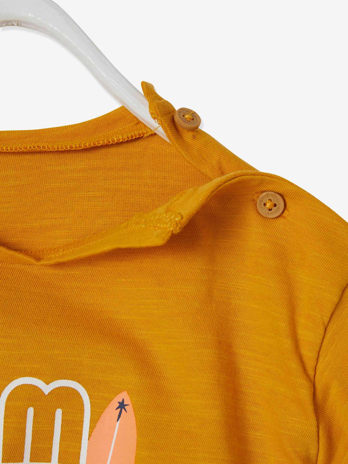 Vestido infantil 2 em 1 com laço, amarelo escuro liso com estampa.