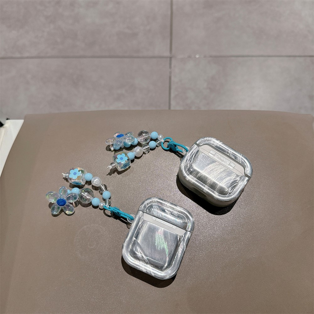 AirPods Pro Gummi Case Schutzhülle mit Handschlaufe Blumen Design - Blau / Transparent
