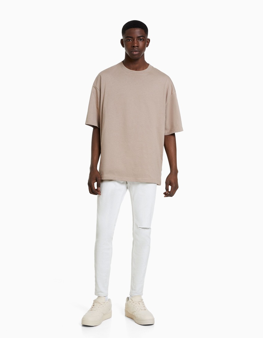 calças jeans super skinny