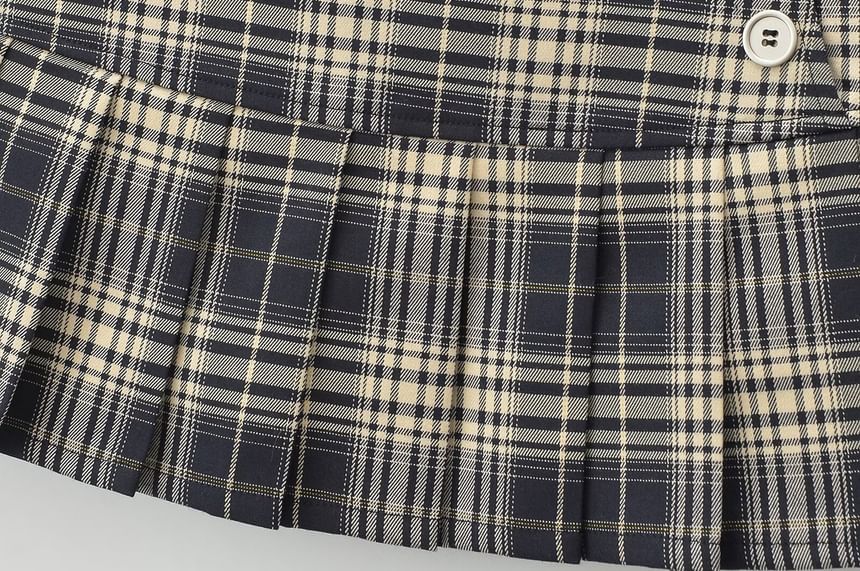 Sundine - Geruite mini-A-lijn rok met lage taille en knoopaccent