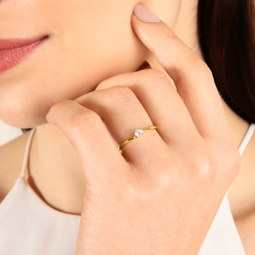 Solitärring 750/18 K Gelbgold mit Diamant 0.12ct H/Si