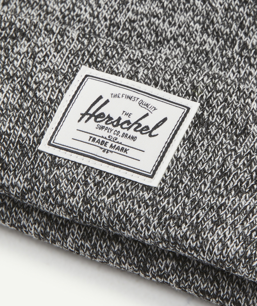 HERSCHELBONNET ADO ELMER SHALLOW EN MAILLE GRIS FONCÉ MOUCHETÉ