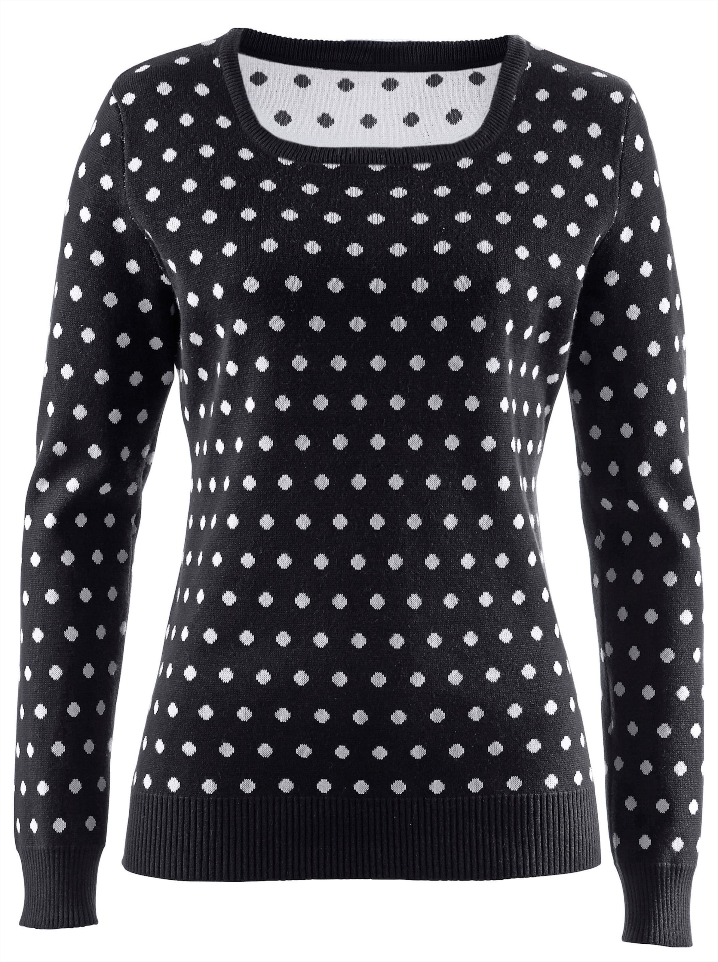 Strickpullover in schwarz-weiß-getupft