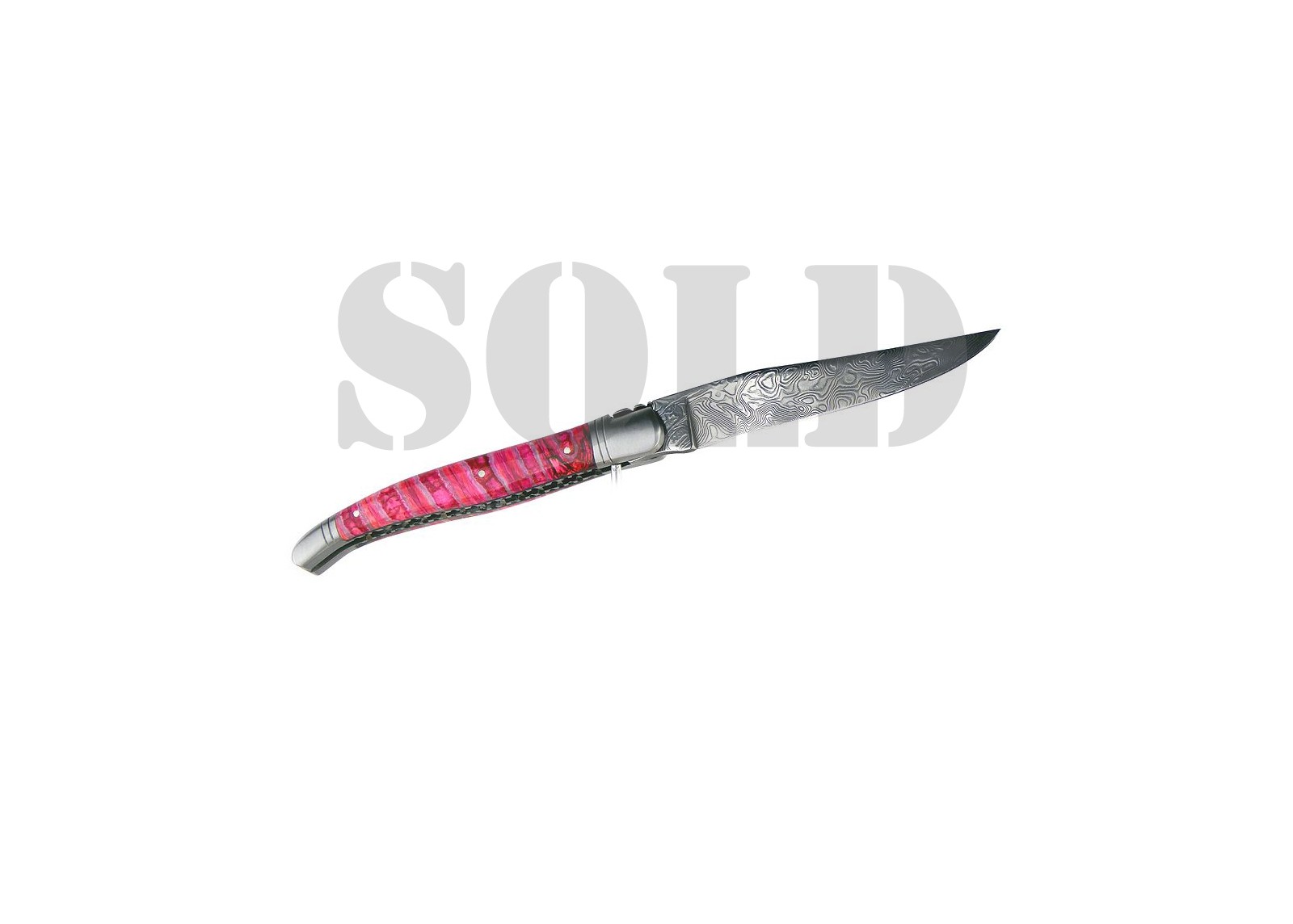 VENDU - Couteau Laguiole avec un manche en Molaire de Mammouth teintée rose