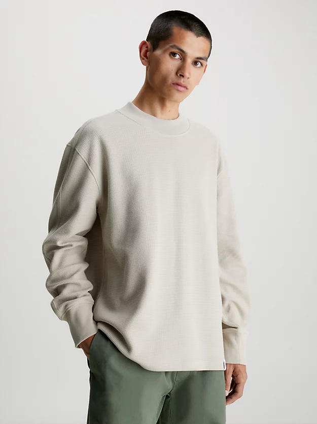 Camiseta de manga comprida com modelagem relaxada e padrão favo de mel