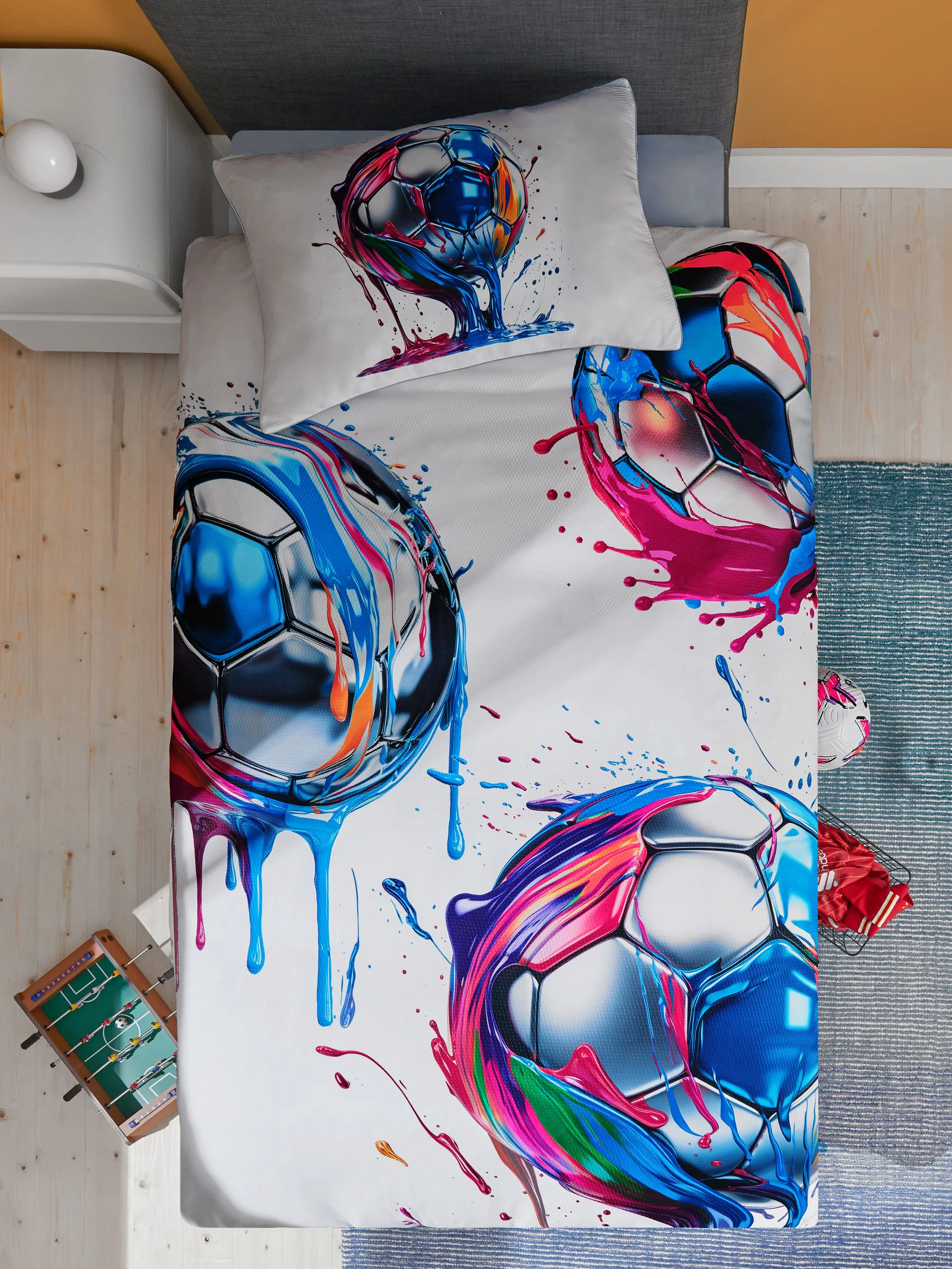 Set van dekbedovertrek en kussensloop met textuur en voetbalprint