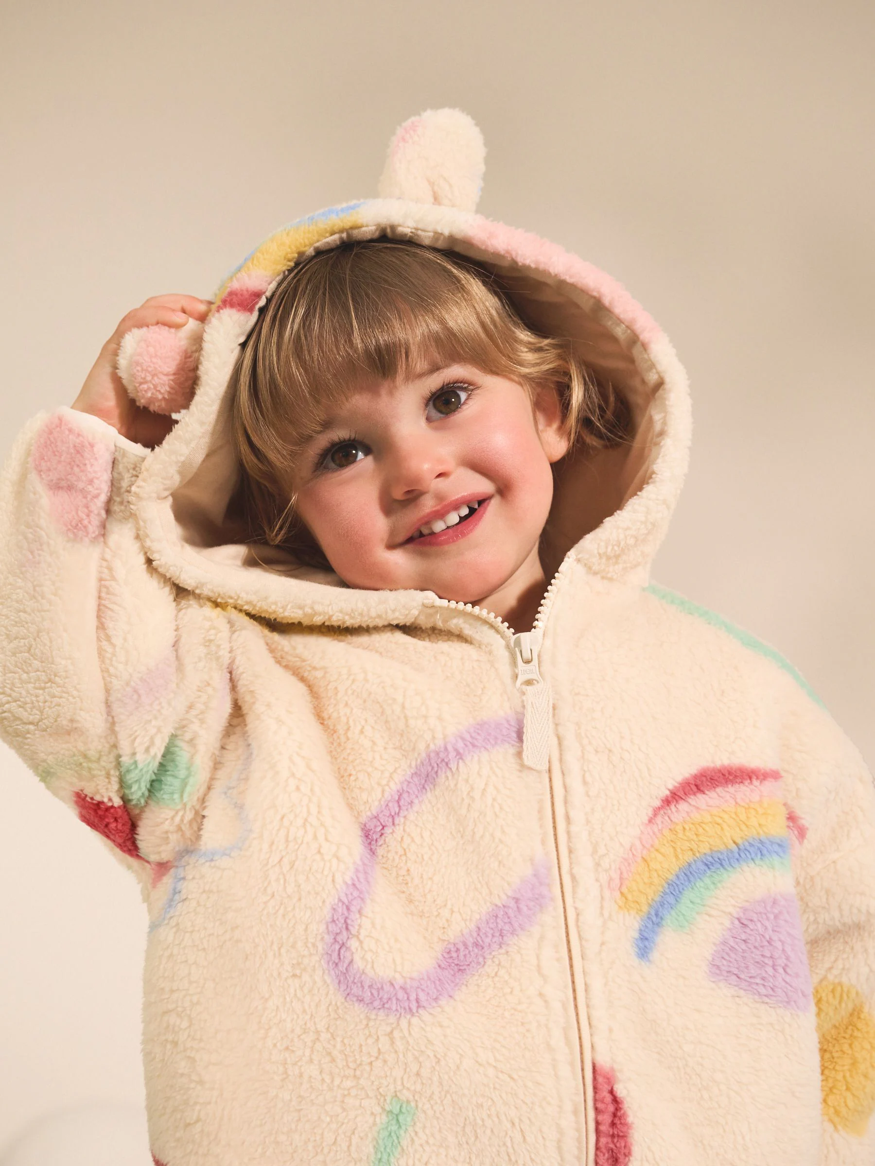 Crème tekeningetjes print - Fleece met ritssluiting (3mnd-7jr)