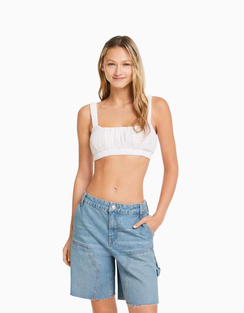 Bermuda jeans de carpinteiro