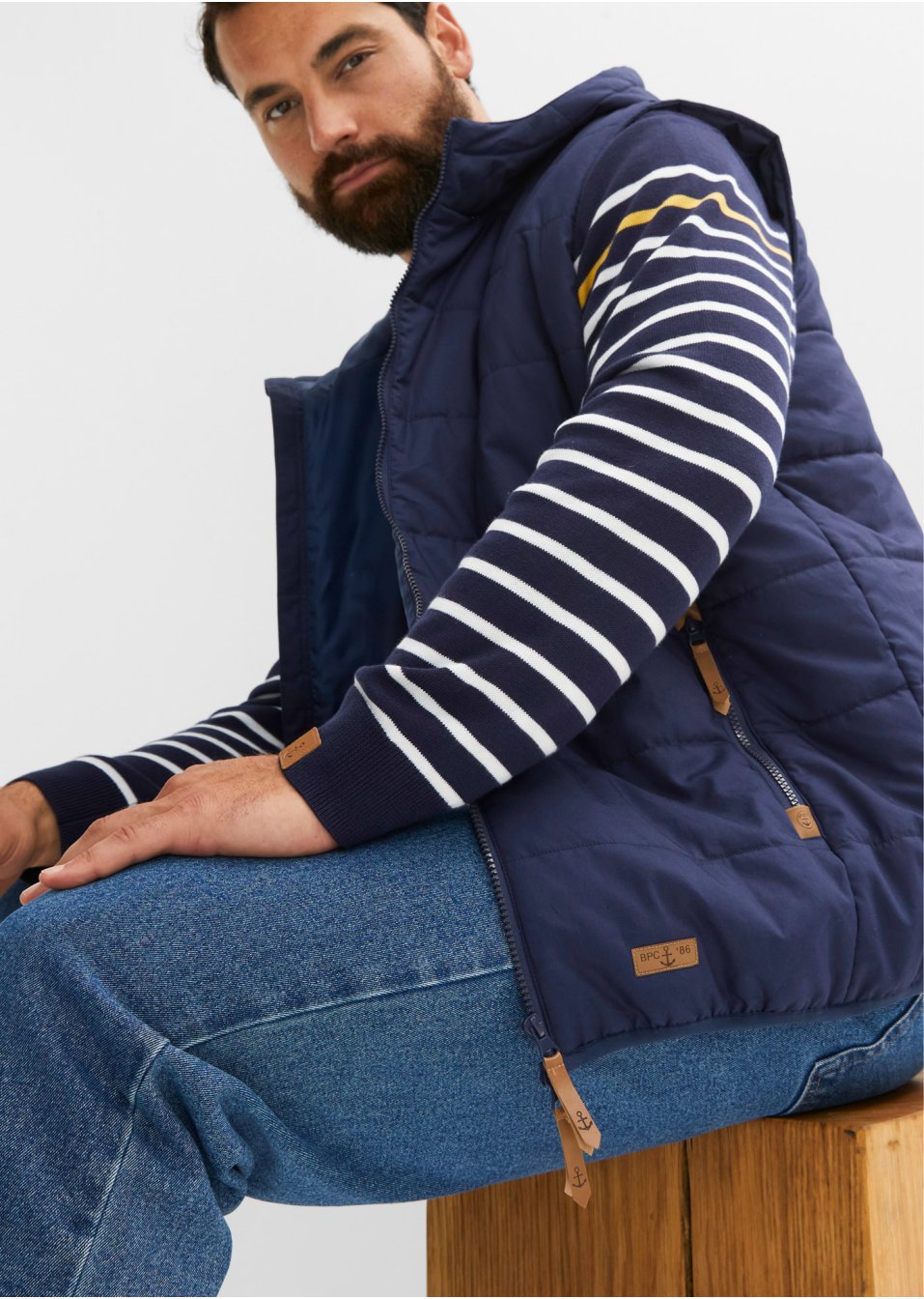Veste sans manches matelassée à capuche