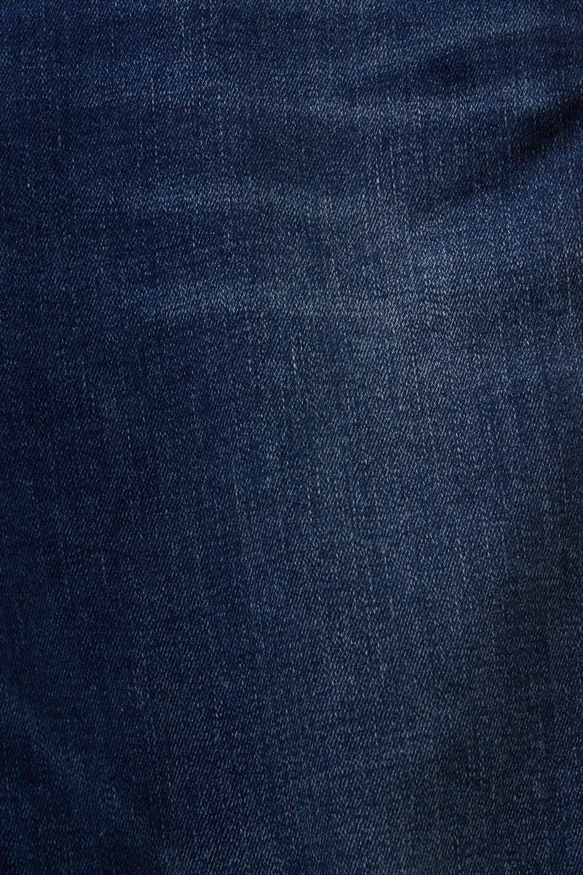 En matière recyclée : jean stretch de coupe Skinny Fit taille haute