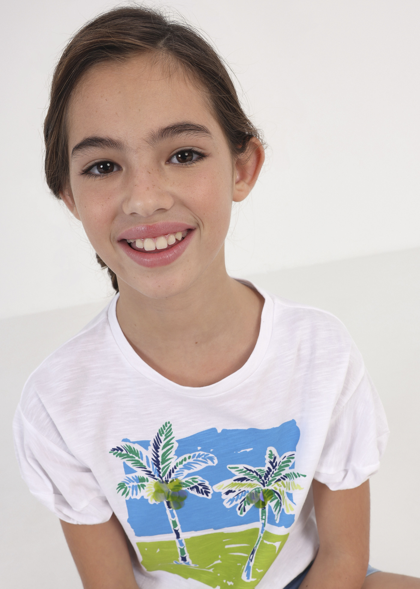 Camiseta feminina de algodão sustentável com mangas bufantes